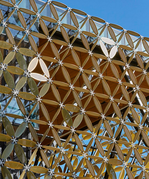 a geometric 'petal' façade clads HASSELL's new student hub for university in australia
