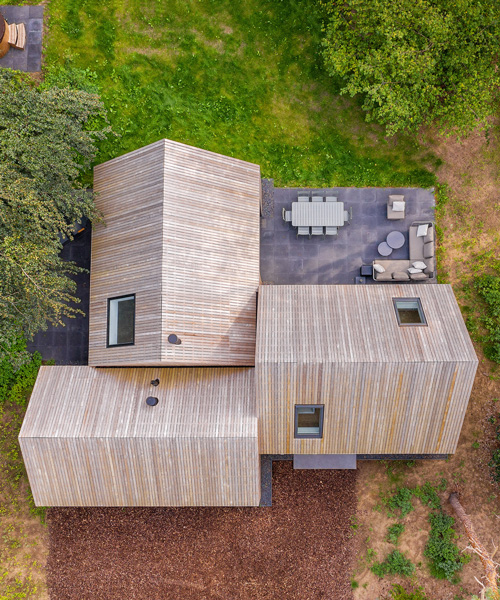 hofmandujardin combines three wood-clad volumes into 'villa tonden' in the netherlands