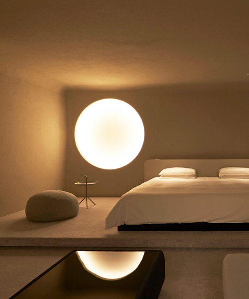 kyoto hotel room by kubo tsushima features a 'moon' light fixture that waxes and wanes