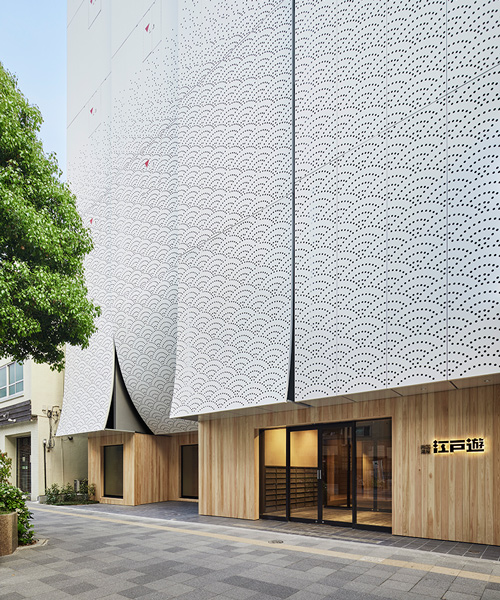kubo tsushima architects renovates and extends 'edoyu' spa in tokyo with curtain-like façade