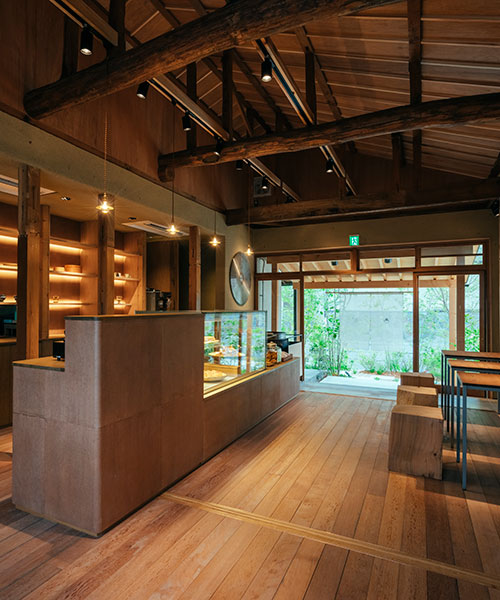 mud walls, solid wood + copper finishes complete restaurant interior by studio suido in osaka