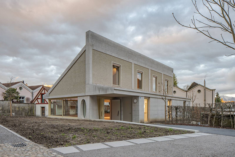 joos & mathys + daniel nyffeler complete the concrete construction with low eaves