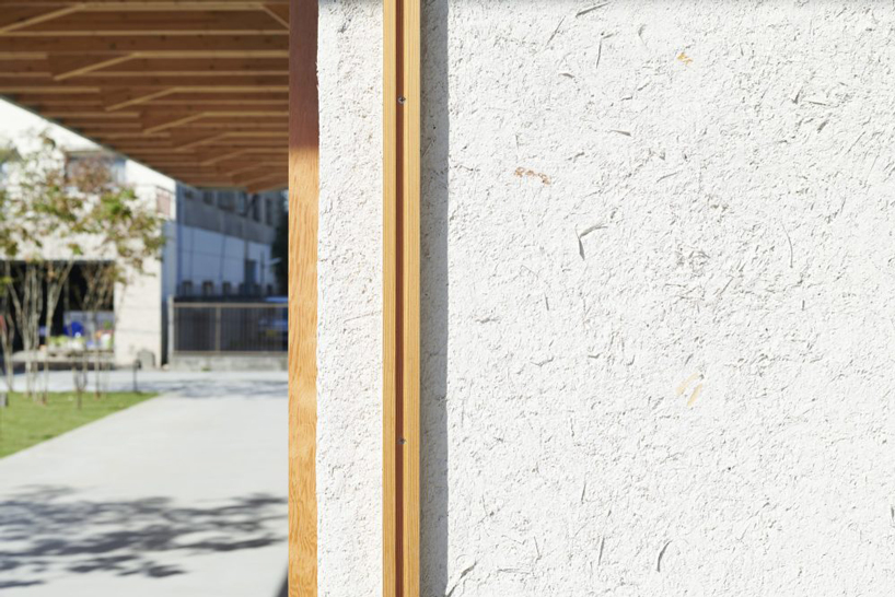 ninkipen! completes gallery for veneer company with deep overhangs in yao, japan