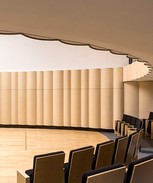 PARC architects restores the auditorium of versailles with waves of blond wood
