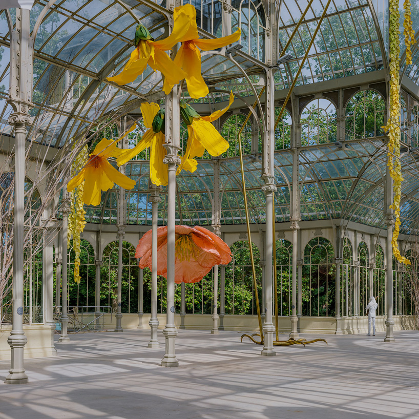 the large flowers made of delicate steel framework and painted canvas