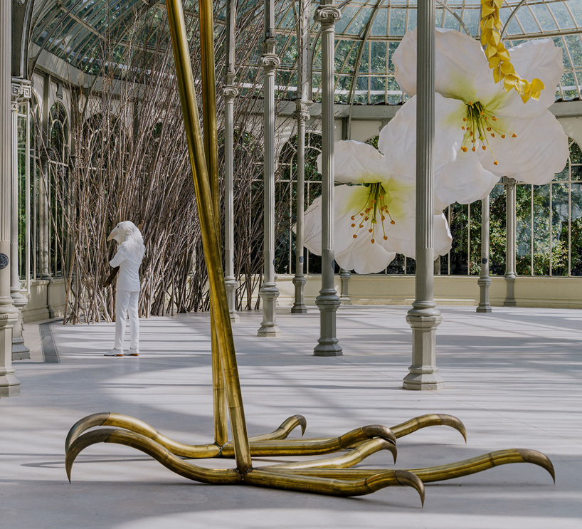 petrit halilaj turns madrid's palacio de cristal into nest of giant flowers