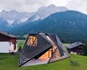 plasma studio cloaks a faceted timber skin over its tyrolean 'paramount alma' house