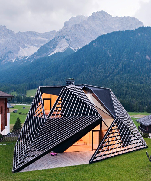 plasma studio cloaks a faceted timber skin over its tyrolean 'paramount alma' house