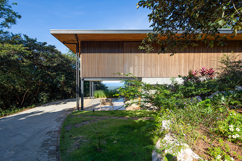 Salagnac Arquitectos Designs Casa Guayacán As Glowing Timber Volume