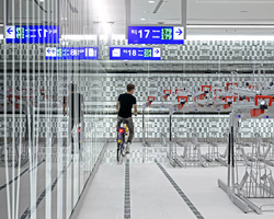 this bicycle parking garage in the netherlands offers a museum-like experience