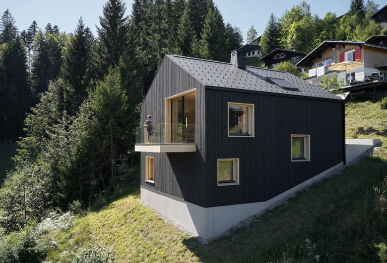 stefan schweighofer wraps austrian holiday house in black wood