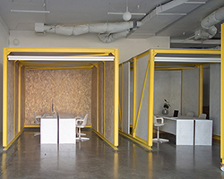 studio edwards inserts adaptive yellow-framed work pods into sackville studio, melbourne