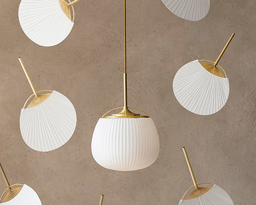 traditional chinese cooling fan meets luminaire design in 'ogi lamp' by yen-hao, chu