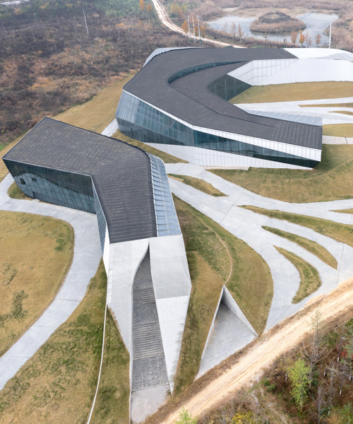 gestural volumes by plasma studio + PMA emerge from sculpted xixian landscape