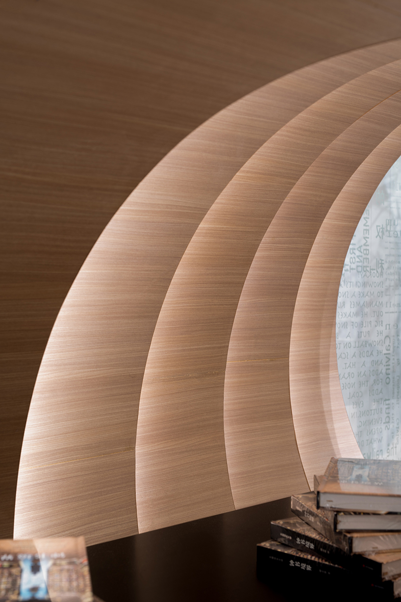 contemporary moon gates connect x+living's zhongshuge bookstore in beijing designboom