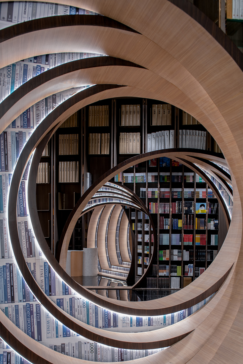 contemporary moon gates connect x+living's zhongshuge bookstore in beijing designboom