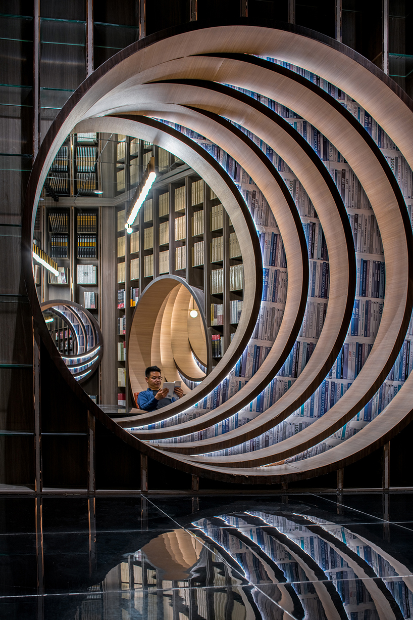 contemporary moon gates connect x+living's zhongshuge bookstore in beijing designboom
