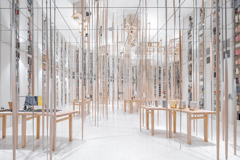 contemporary moon gates connect x+living's zhongshuge bookstore in beijing