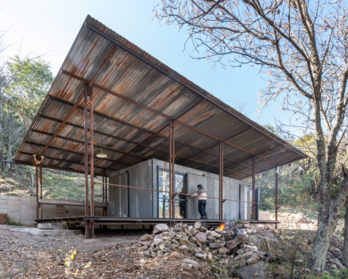 STC arquitectos uses recycled oil pipes and metal sheets to create refuge in rural argentina