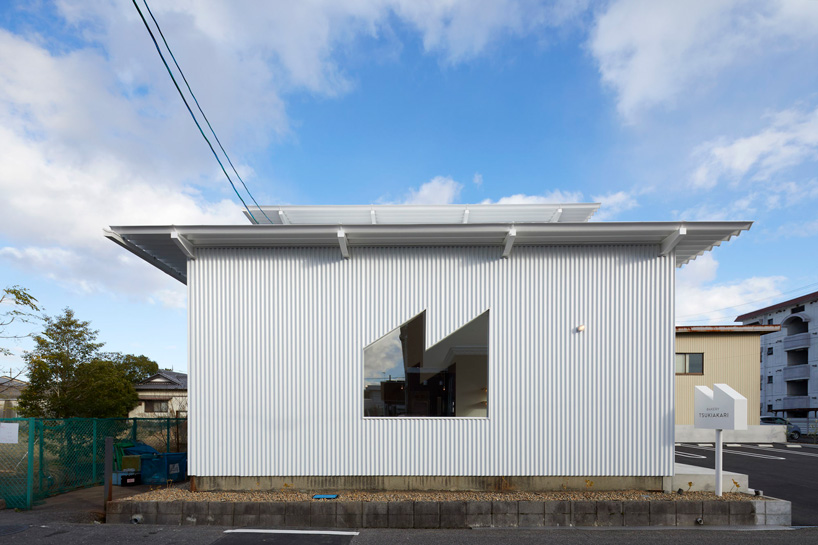 airhouse completes 'bakery tsukiakari' in japan with half-moon counter