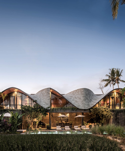alexis dornier tops 'alpha house' in bali with sculptural, undulating roof
