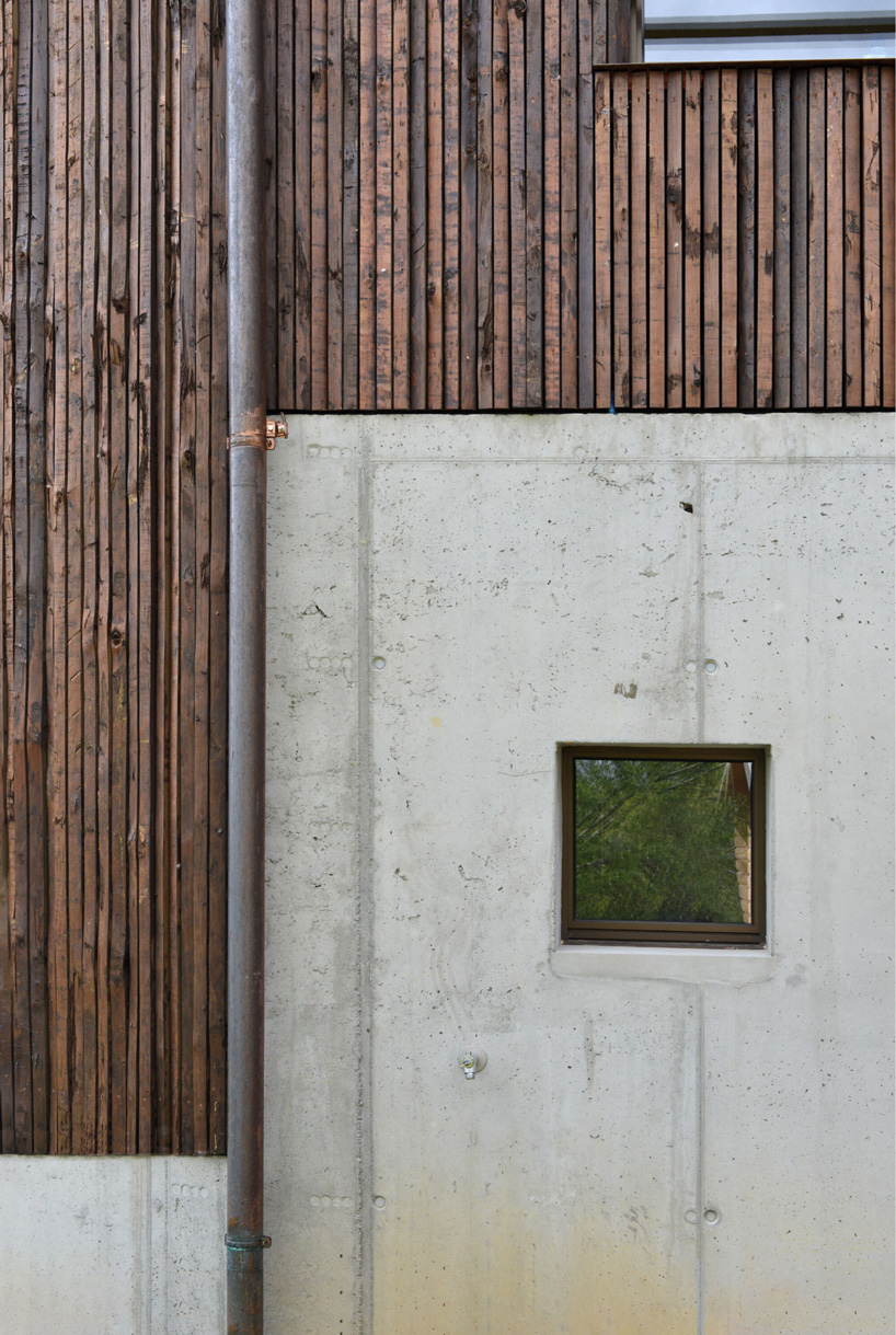 concrete and tree bark detail of the façade