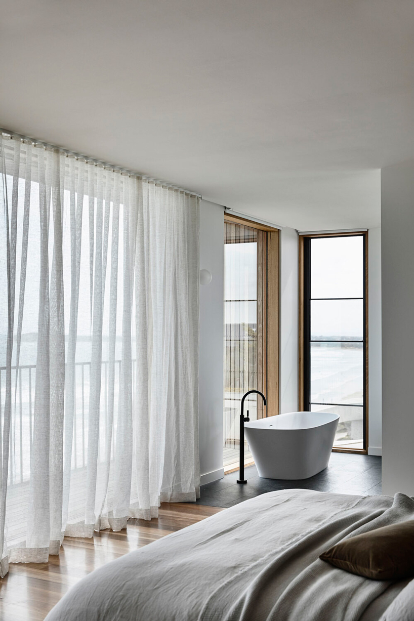 auhaus builds a beachside house around a central courtyard in australia designboom