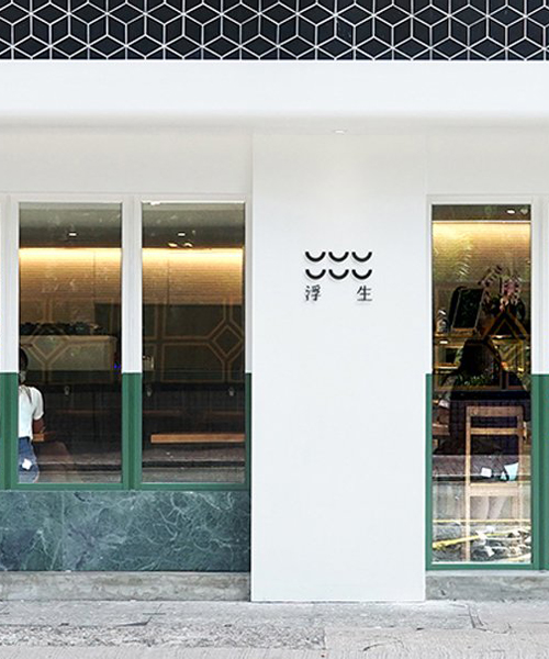 hong kong's 'cafe wander' is designed in two halves by absence from island + studio etain ho