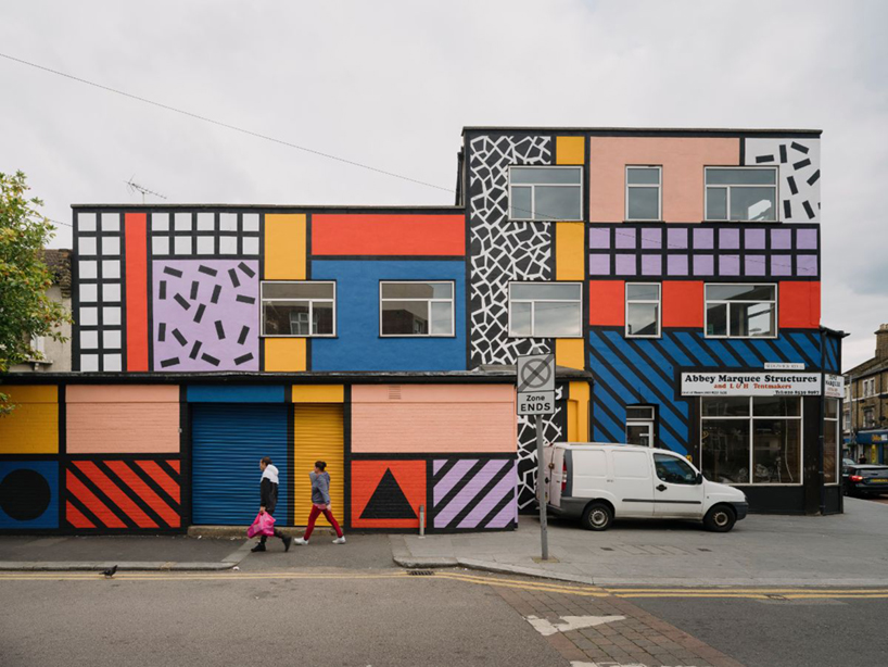 camille walala brightens the streets of east london with completed mural 'walala parade'