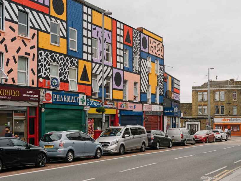 camille walala brightens the streets of east london with completed mural 'walala parade'