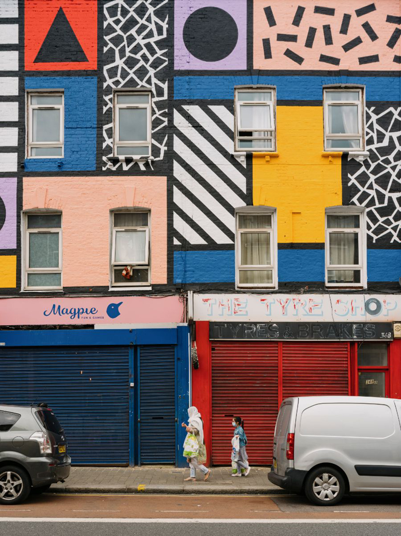 camille walala brightens the streets of east london with completed mural 'walala parade'
