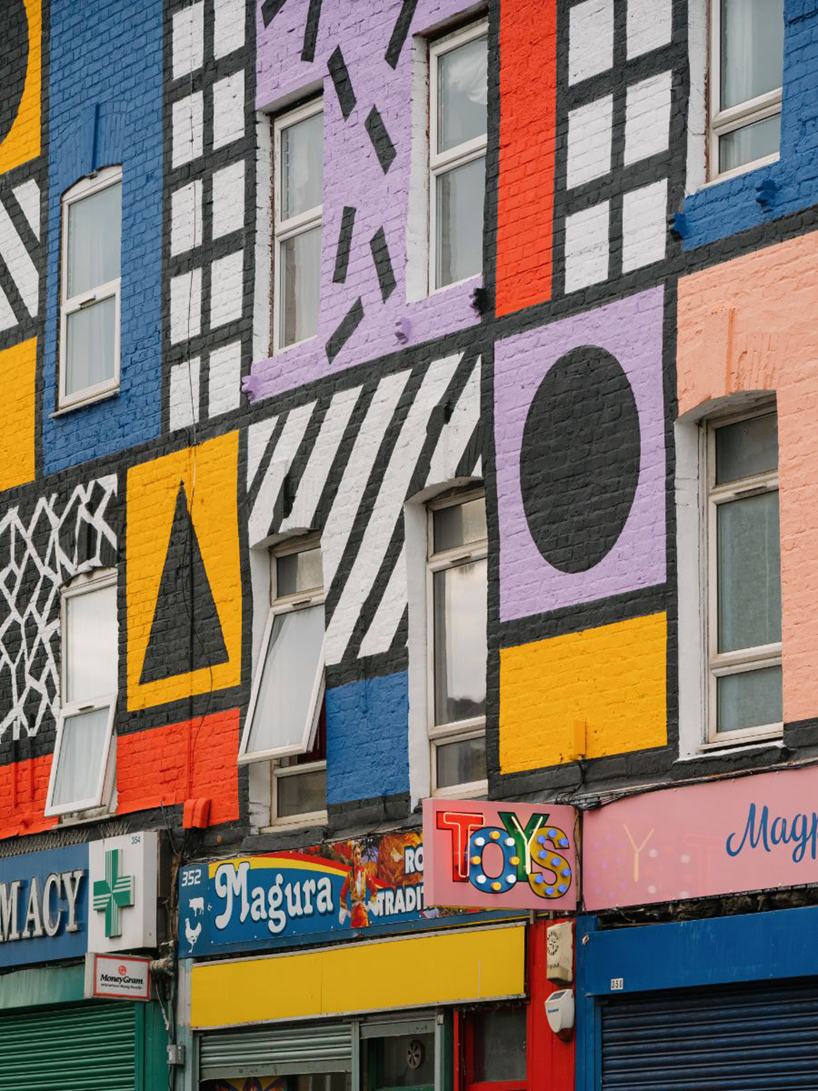 camille walala brightens the streets of east london with completed mural 'walala parade'