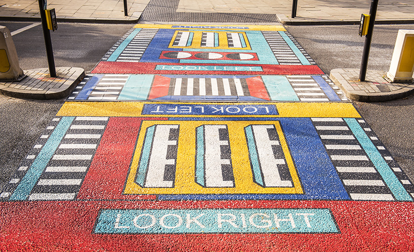 camille walala transforms  london's white city place with colorful geometric patterns