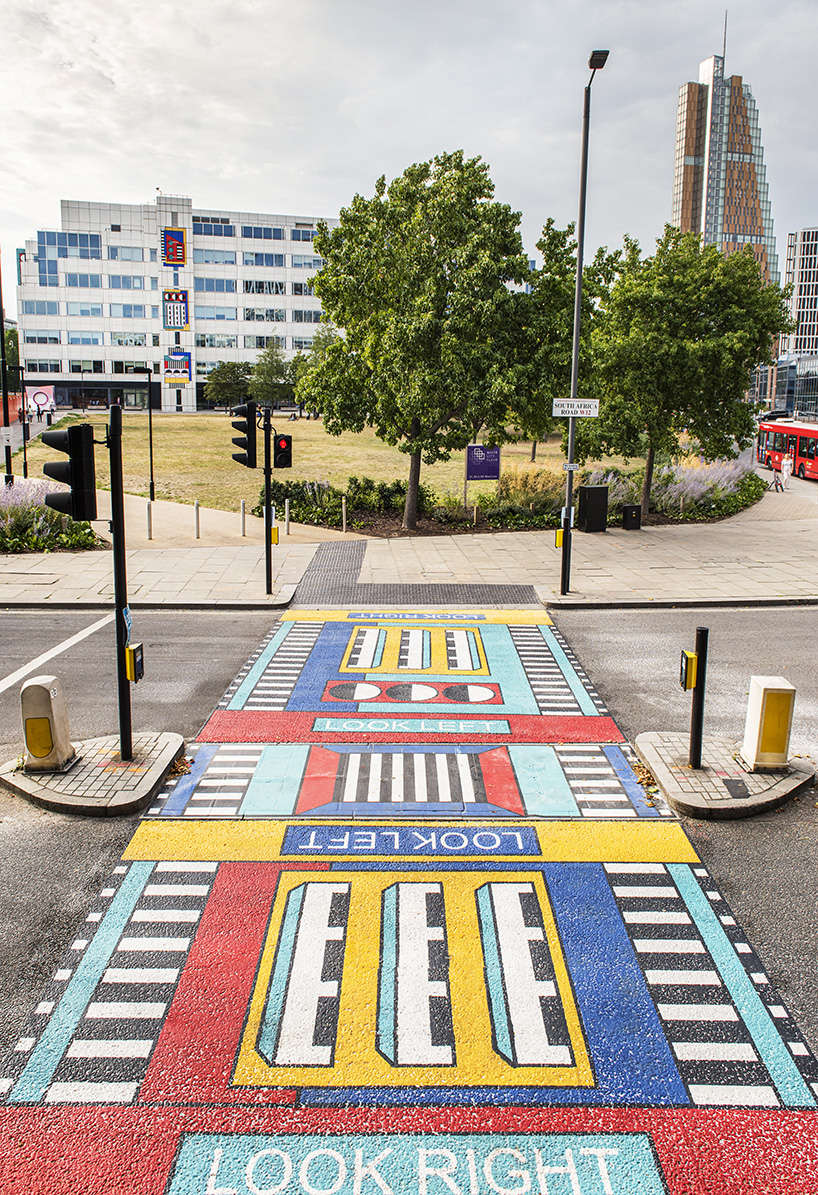 camille walala transforms london's white city place with colorful geometric  patterns