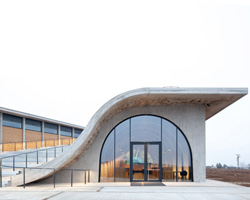 CHYBIK + KRISTOF completes lahofer winery in the czech republic with undulating roof