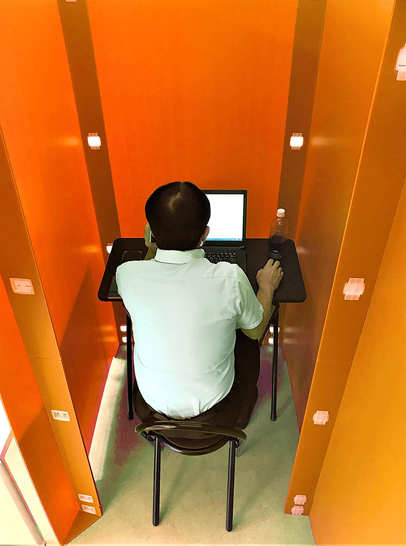 colorful koshitsu-dana partitions assemble private workspaces within rooms