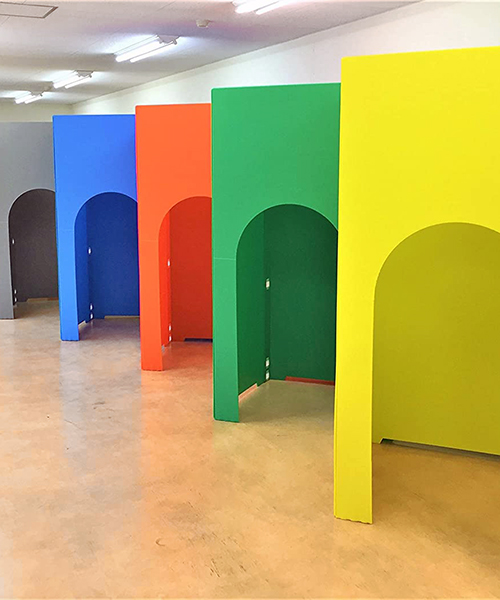 colorful koshitsu-dana partitions assemble private workspaces within rooms