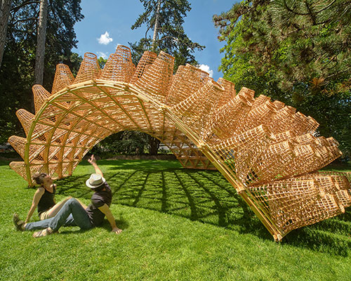 DJA introduces triangular wicker mesh pavilion in france, weaved by latvian craftsmen