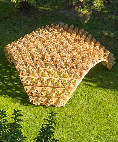 DJA introduces triangular wicker mesh pavilion in france, woven by latvian craftsmen
