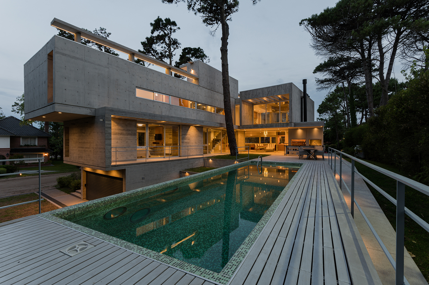 estudio galera's casa jacaranda is a cluster of growing, expanding boxes