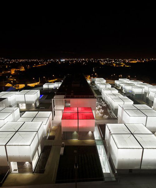 guedes cruz builds social housing with illuminating box roofs for the elderly in portugal