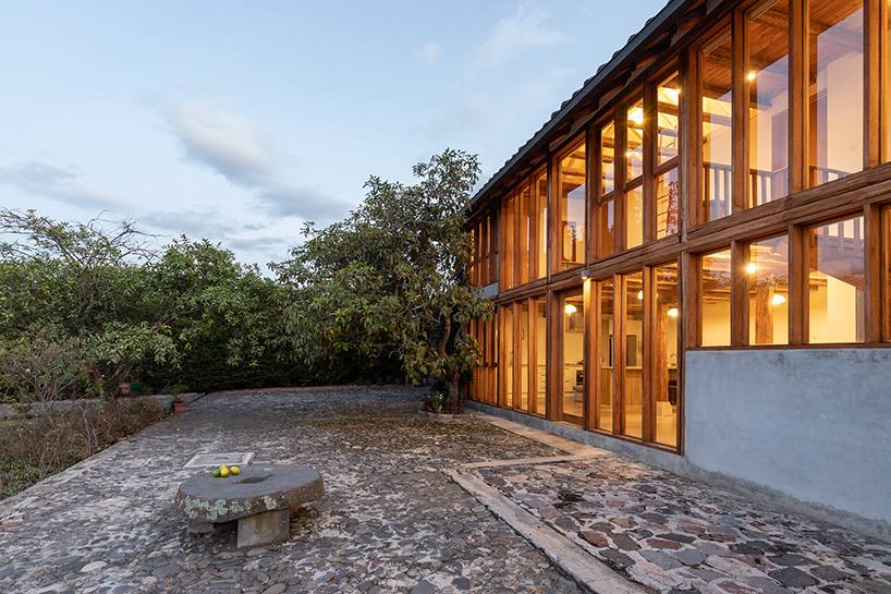 jorge ramón giacometti renovates 'avocados house' in ecuador with new glazed façade