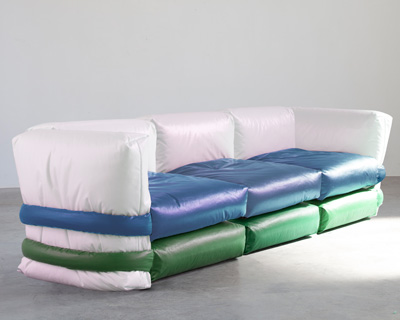 muller van severen's modular 'pillow sofa' for KASSL editions is wrapped in oil-coated fabric