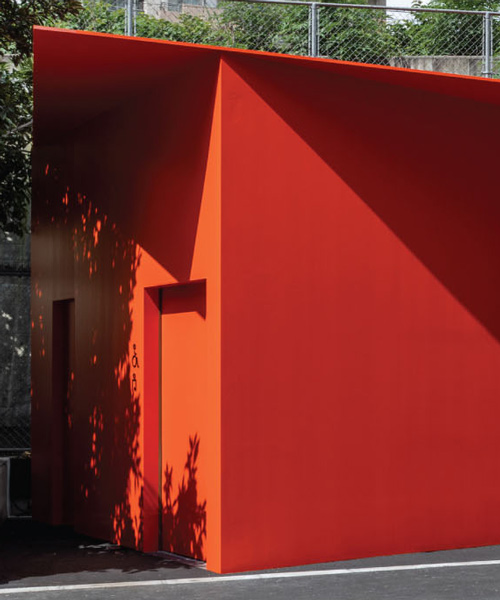 nao tamura designs accessible, all-red restroom as part of 'tokyo toilet' initiative