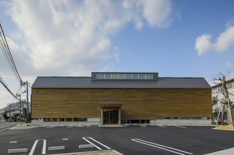 NKS architects designs an office in japan using criss-crossing timber designboom