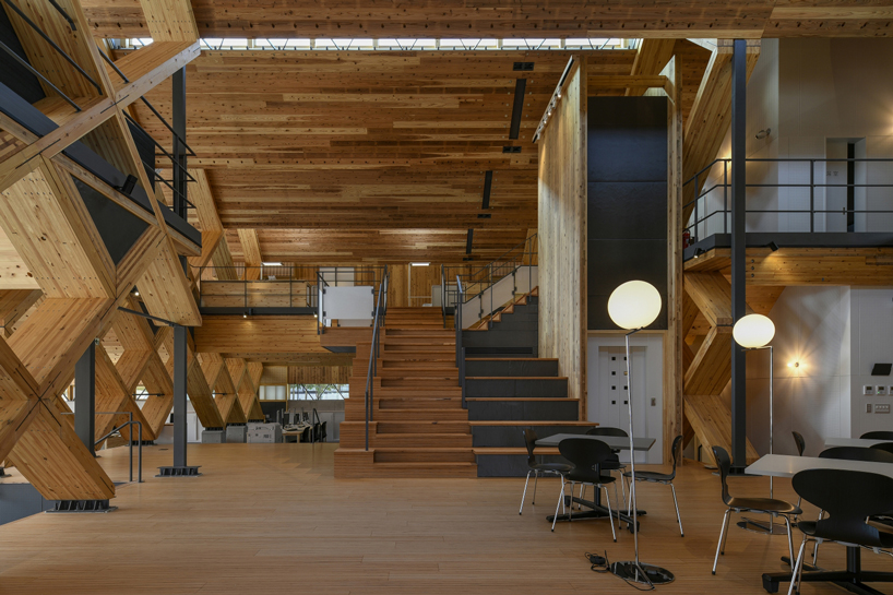 NKS architects designs an office in japan using criss-crossing timber designboom