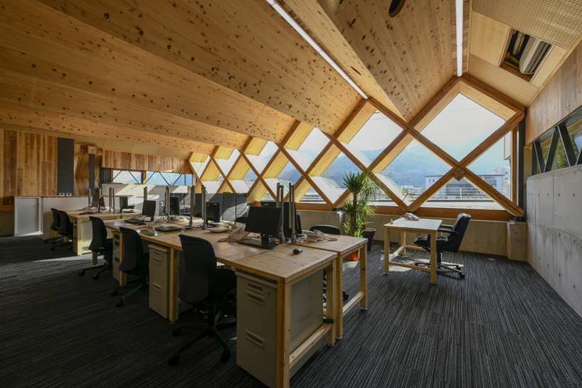 NKS architects designs an office in japan using criss-crossing timber designboom