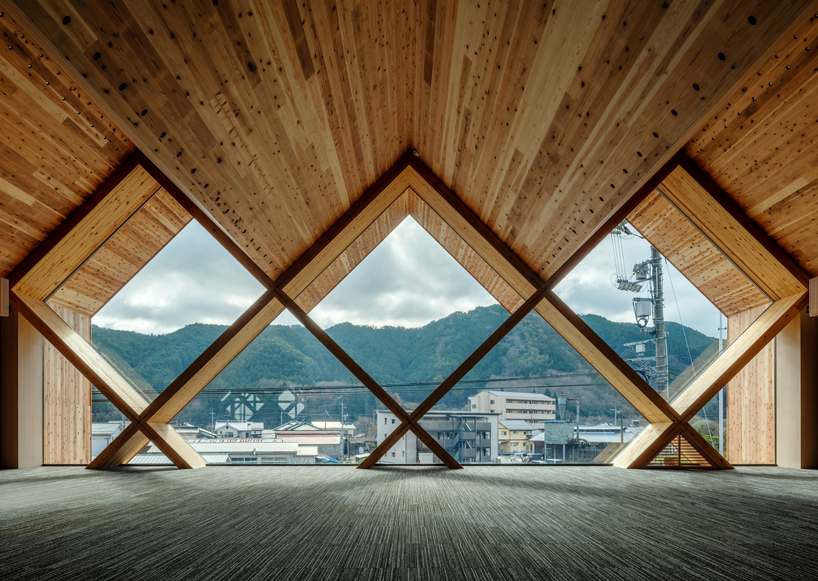 NKS architects designs an office in japan using criss-crossing timber designboom