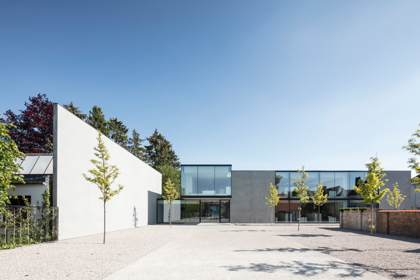 stark geometries define govaert & vanhoutte architects' concrete notary office in belgium