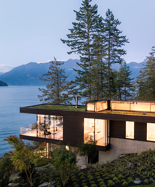 omb designs a contemporary cabin in the woods on the shore of bowen island in canada